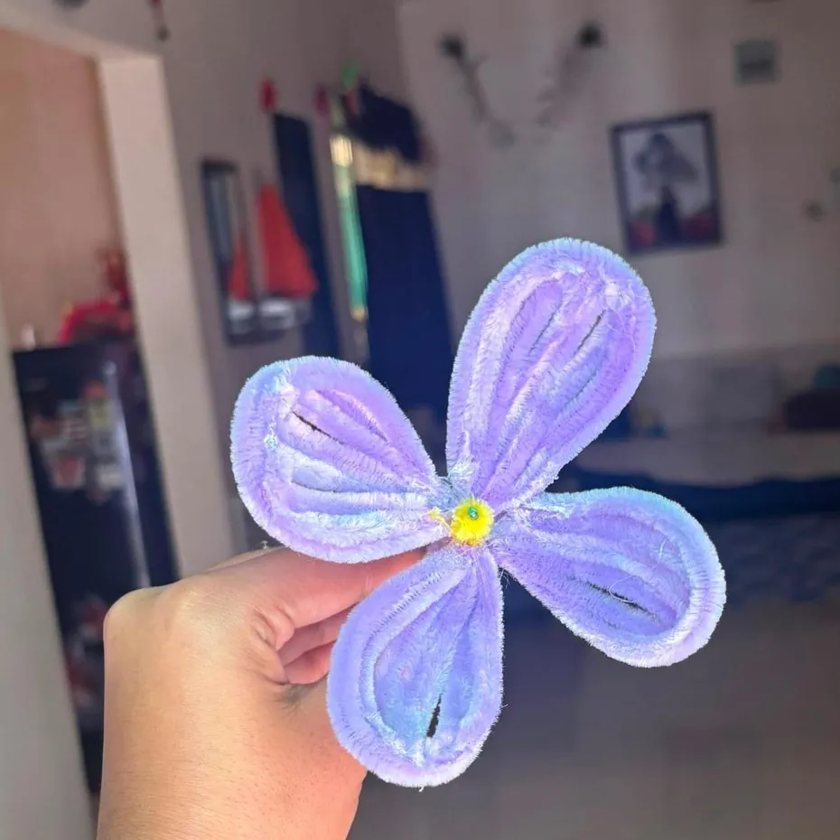 Large handmade lilac four-petal flower with a yellow centre