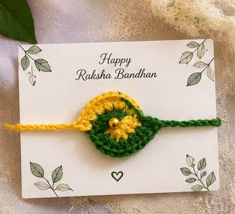 Handmade crochet flower rakhi in yellow and green with gold bead
