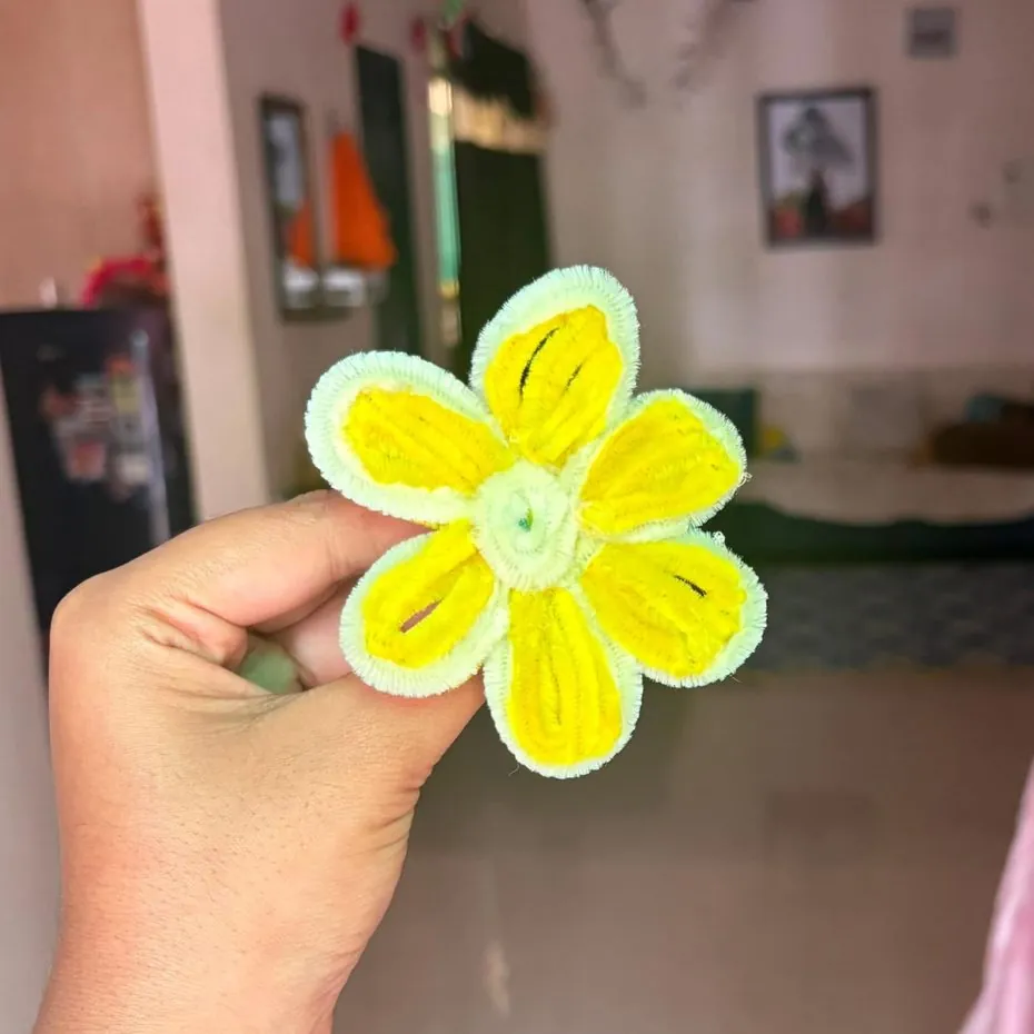 Large handmade yellow daisy flower with mint green edging
