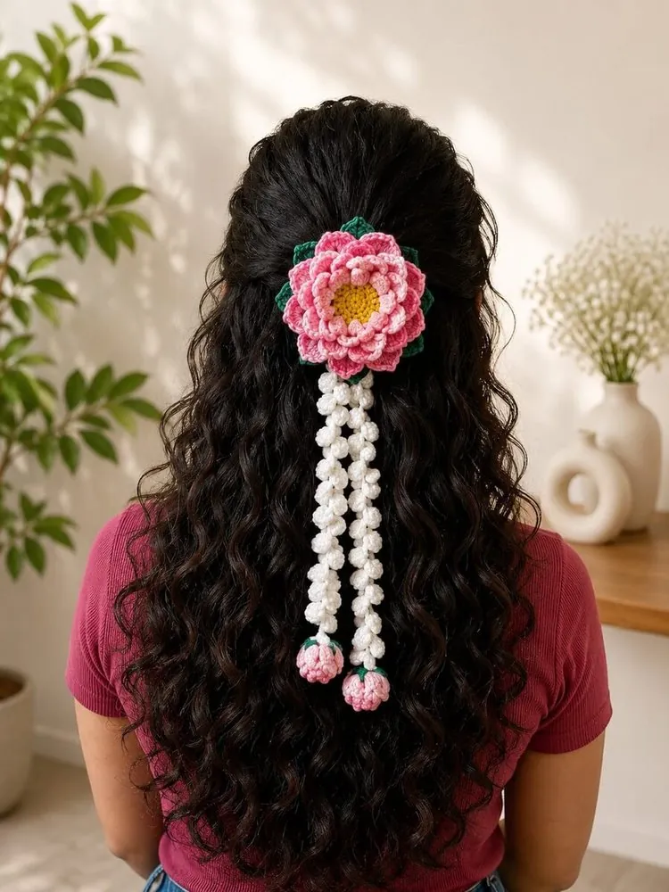 Handmade crochet lotus flower hair clip with white beaded tassels and pink bud ends