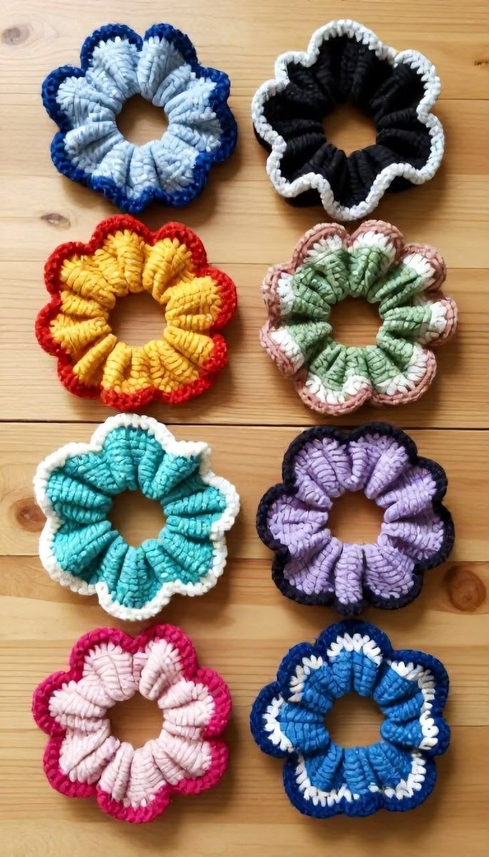 Handmade chunky crochet flower-shaped scrunchies in eight colourways