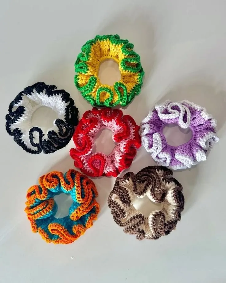 Handmade ruffled crochet scrunchies in six two-tone colourways
