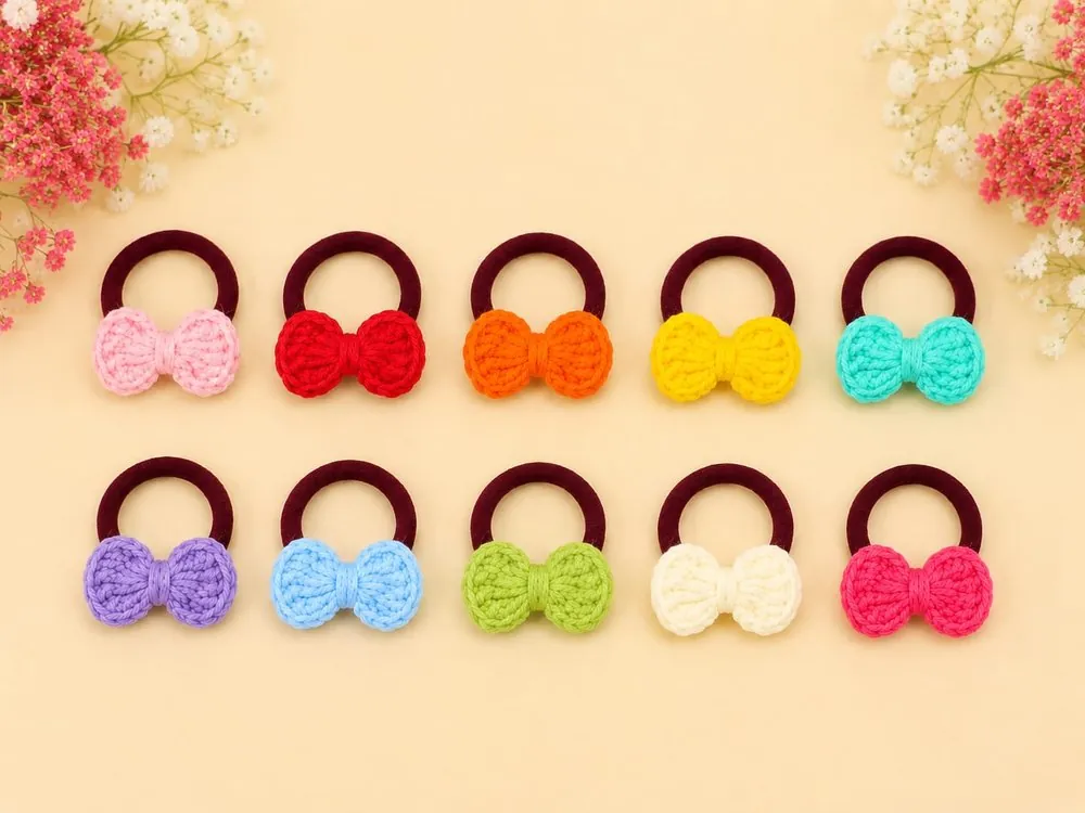 Handmade crochet bow hair ties on soft elastic bands, in ten colours